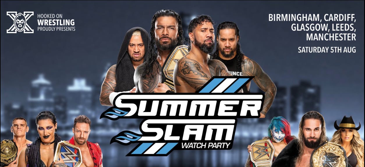 a group of wrestlers posing for a photo