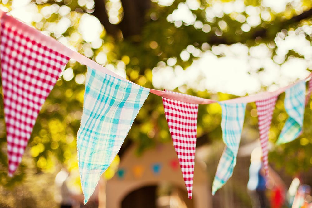 a close up of a string of flags