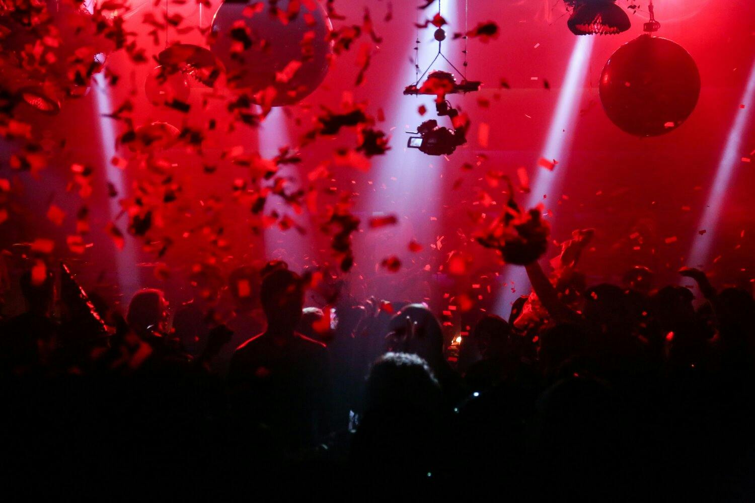 confetti falling in the air at a concert