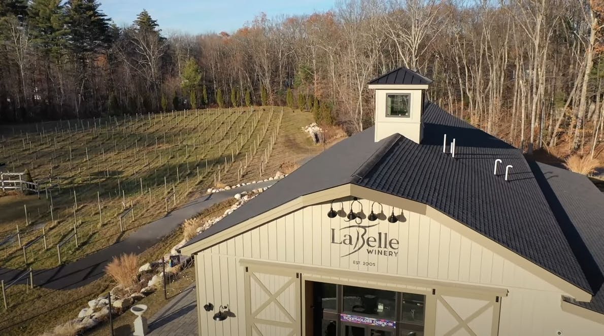LaBelle Winery photo of building from above showing vineyard and forest in background