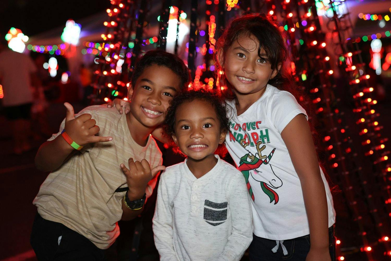 a group of kids posing for a picture