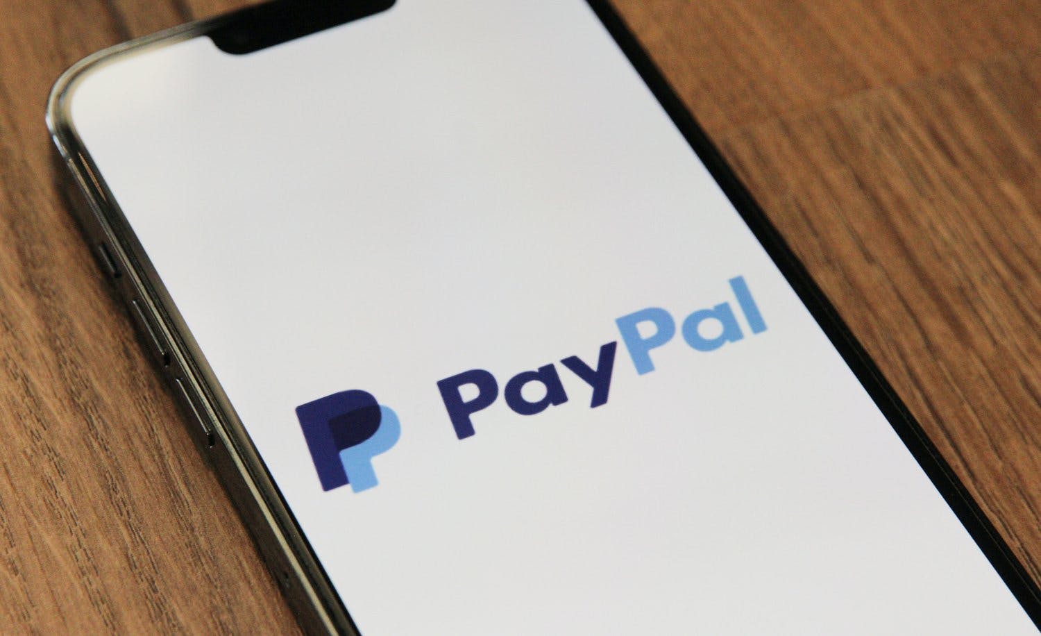 a close up of a phone with PayPal app opened