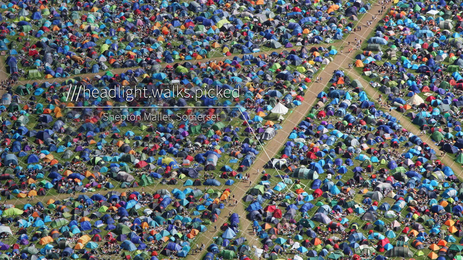 a group of tents in a field