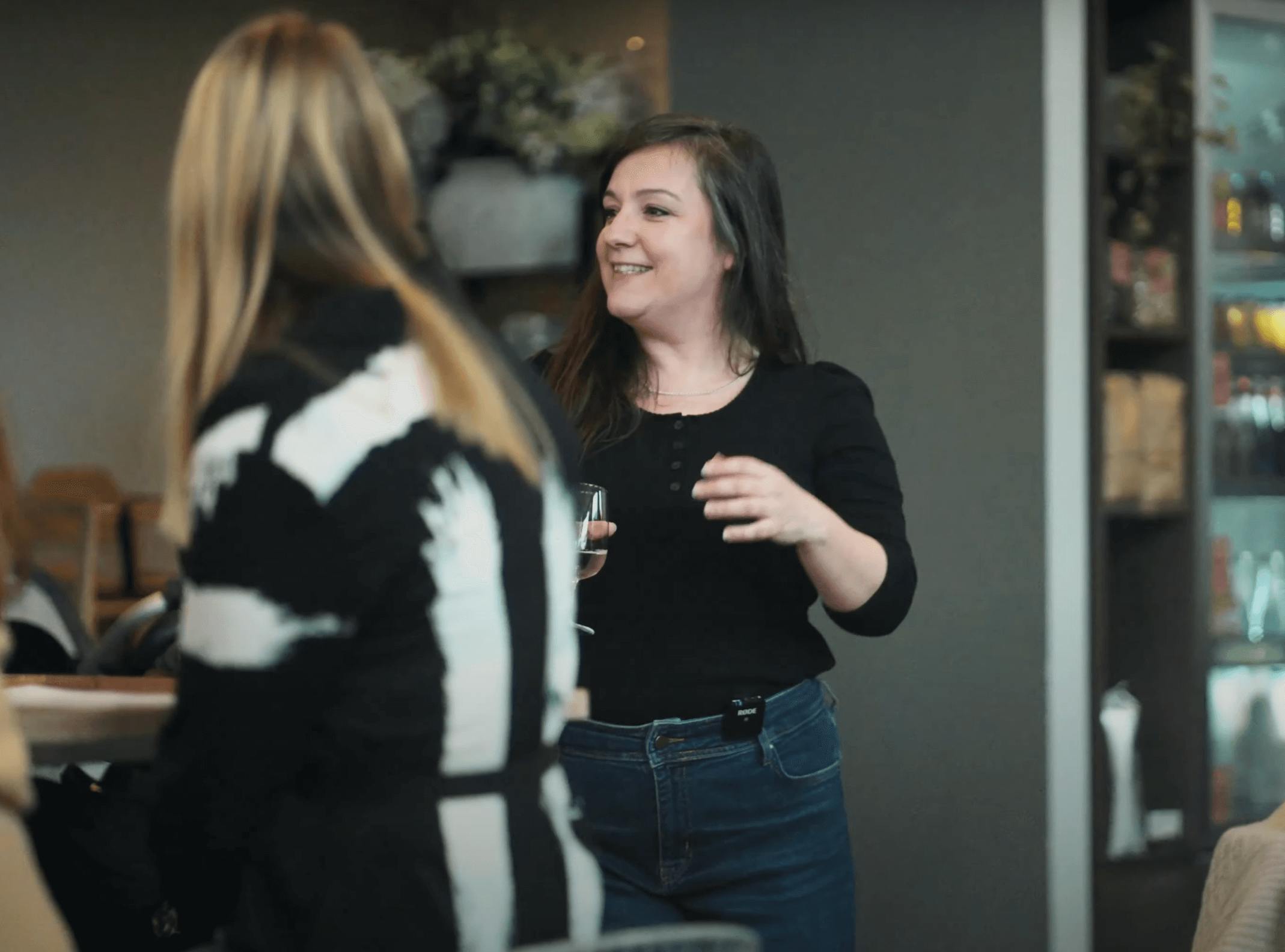 Becky Jackson presenting a wine at her wine tasting