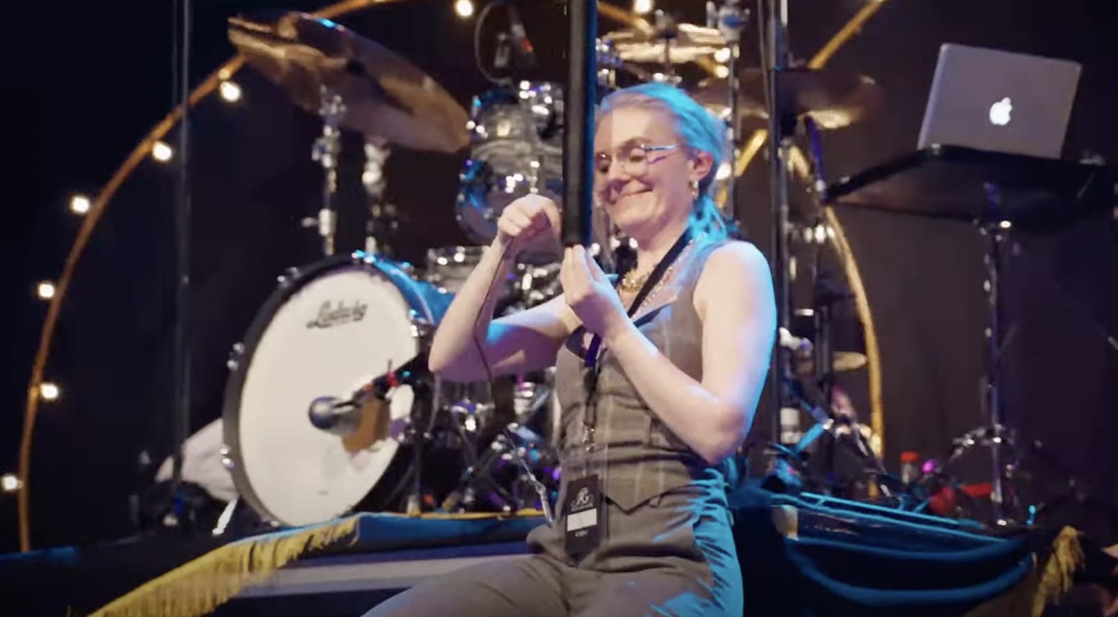 Party like gatsby organizer Julie setting up behind stage