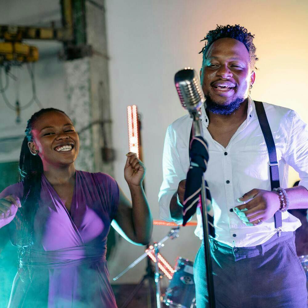 musicians singing and dancing