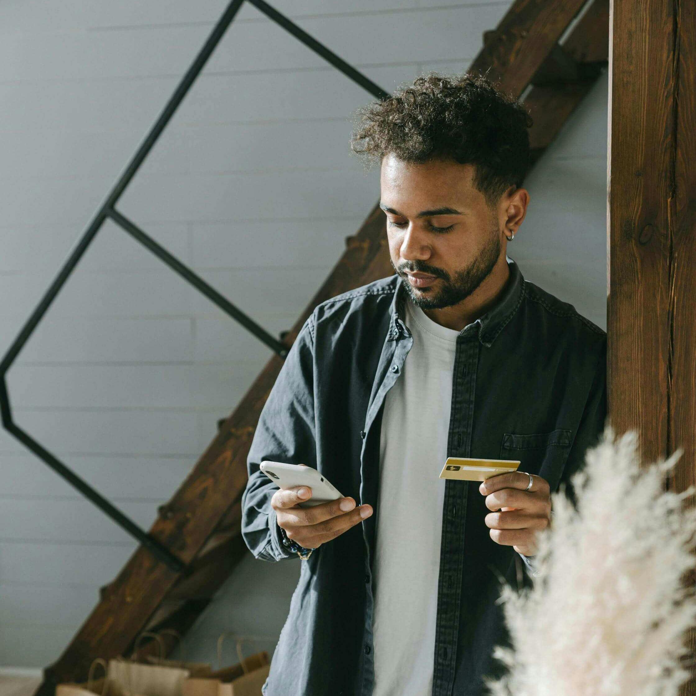 Person making payment on phone