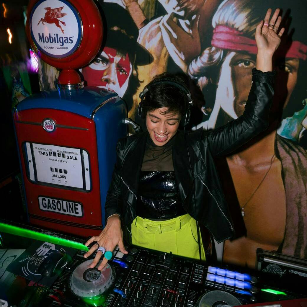 DJ smiling and playing music