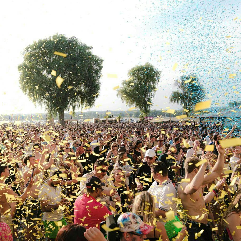 crowd with yellow confetti