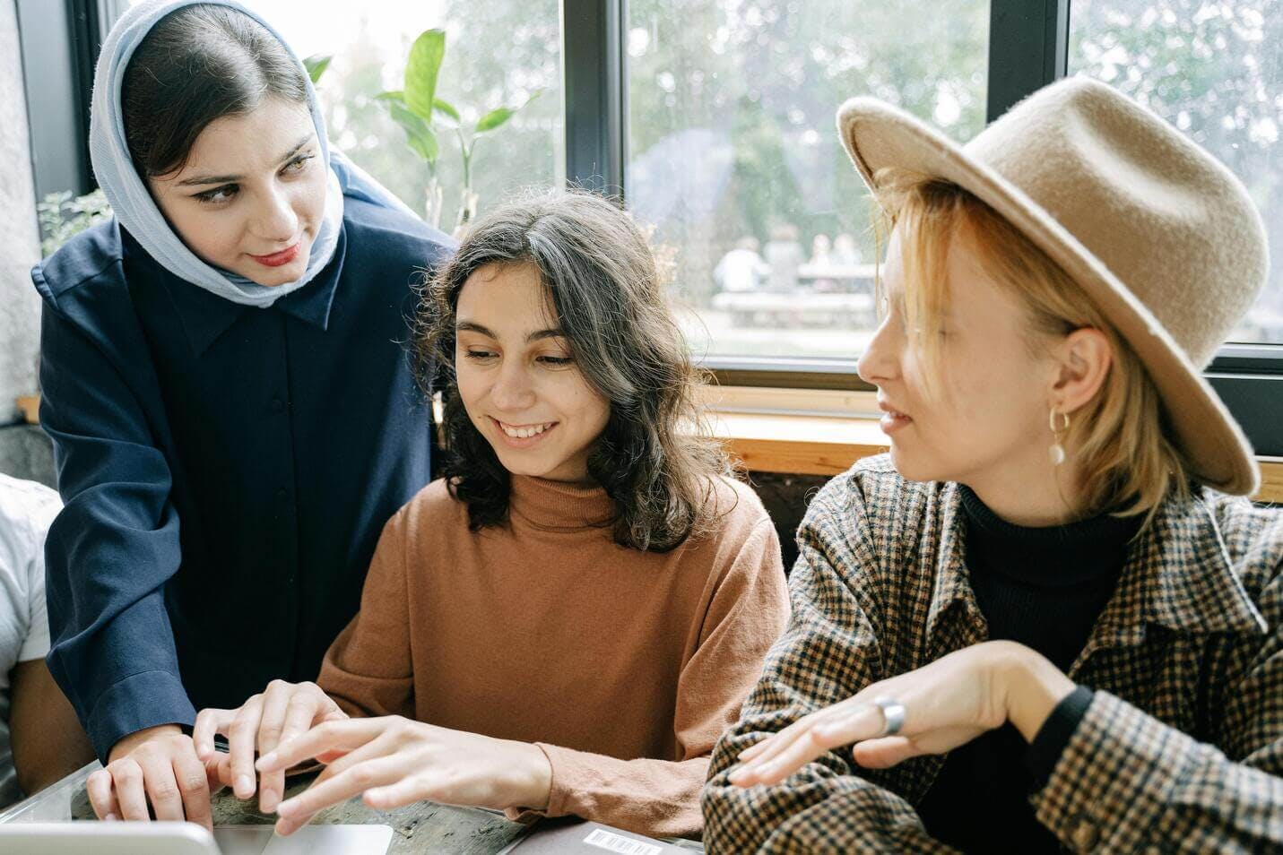 Women working on laptop together