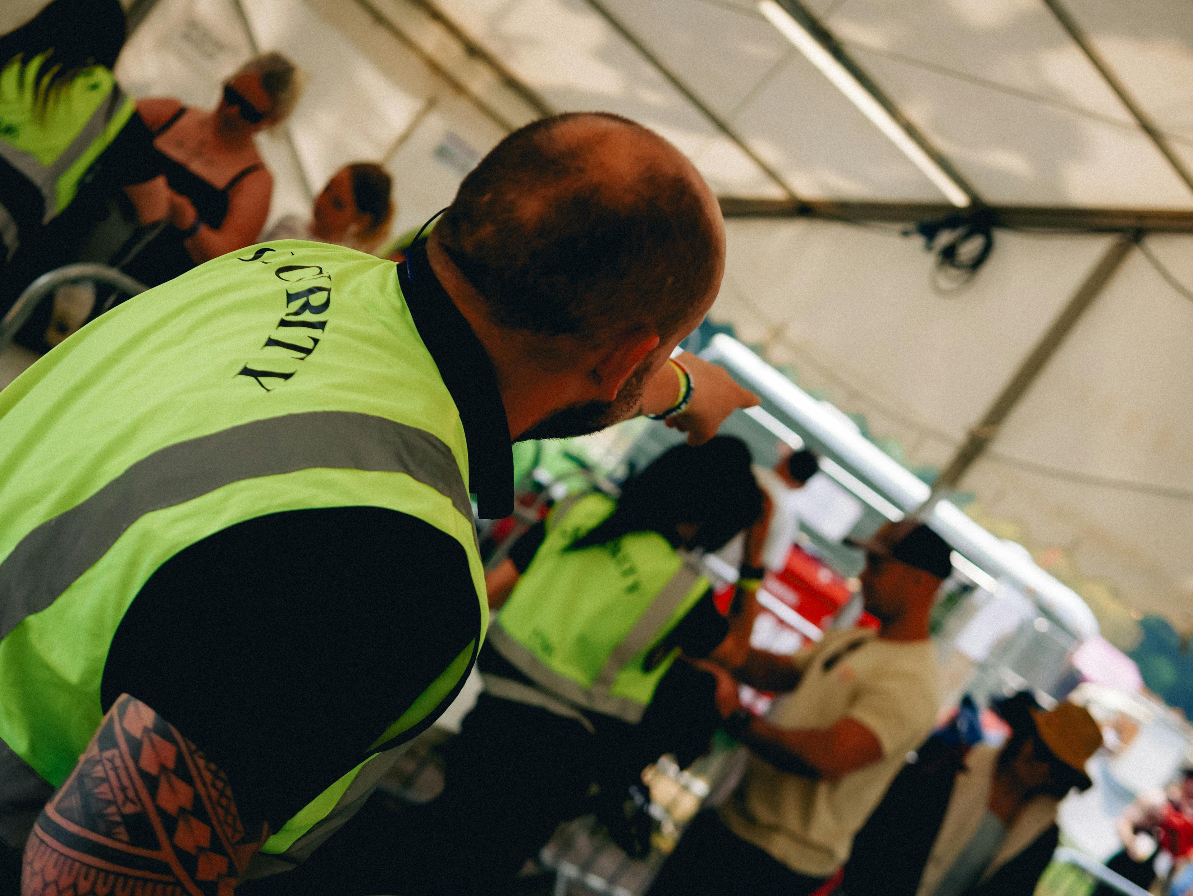 The Great Estate Festival security person checking in lines