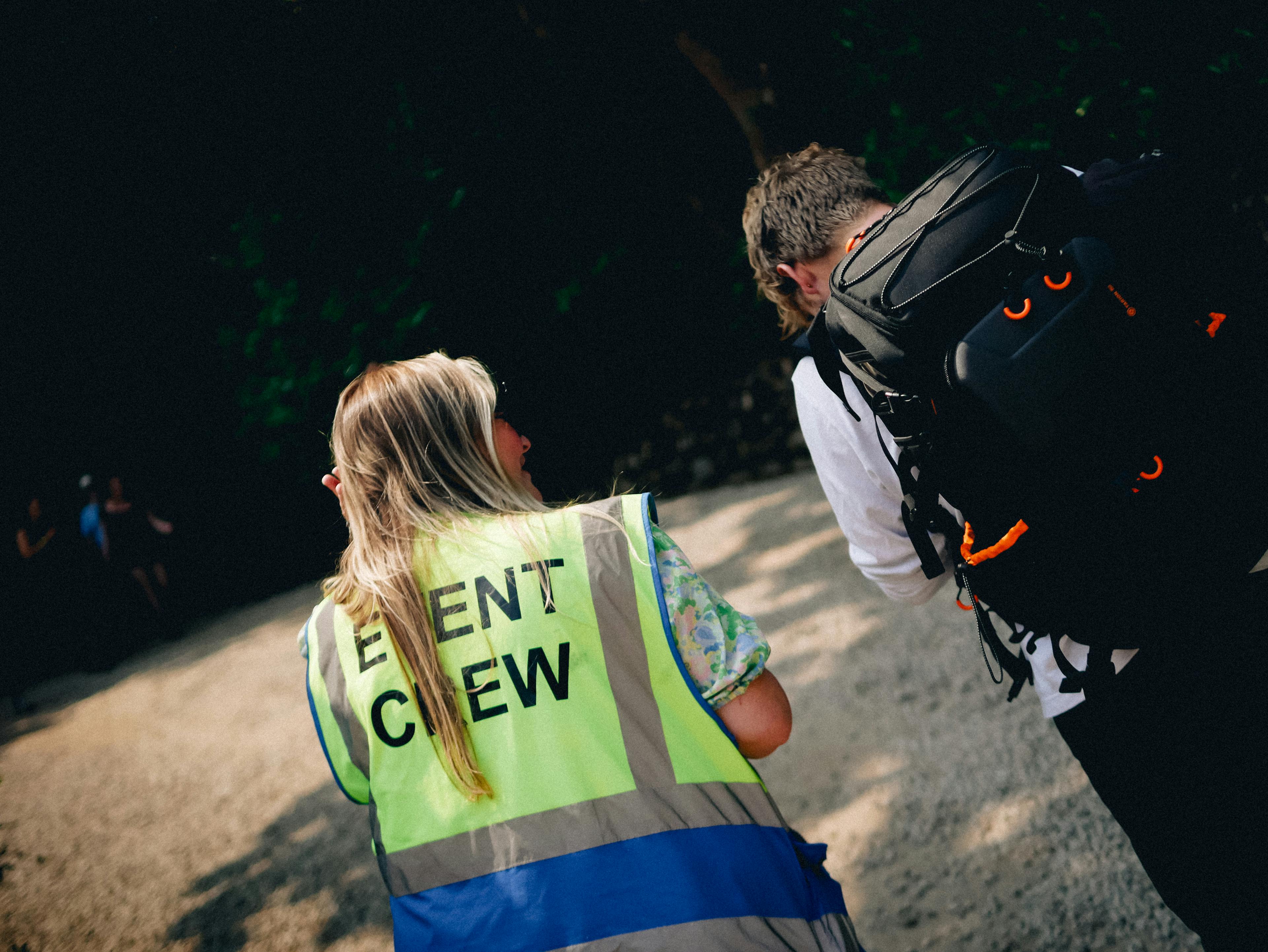 The Great Estate Festival Event Crew high vis jacket helping person with directions