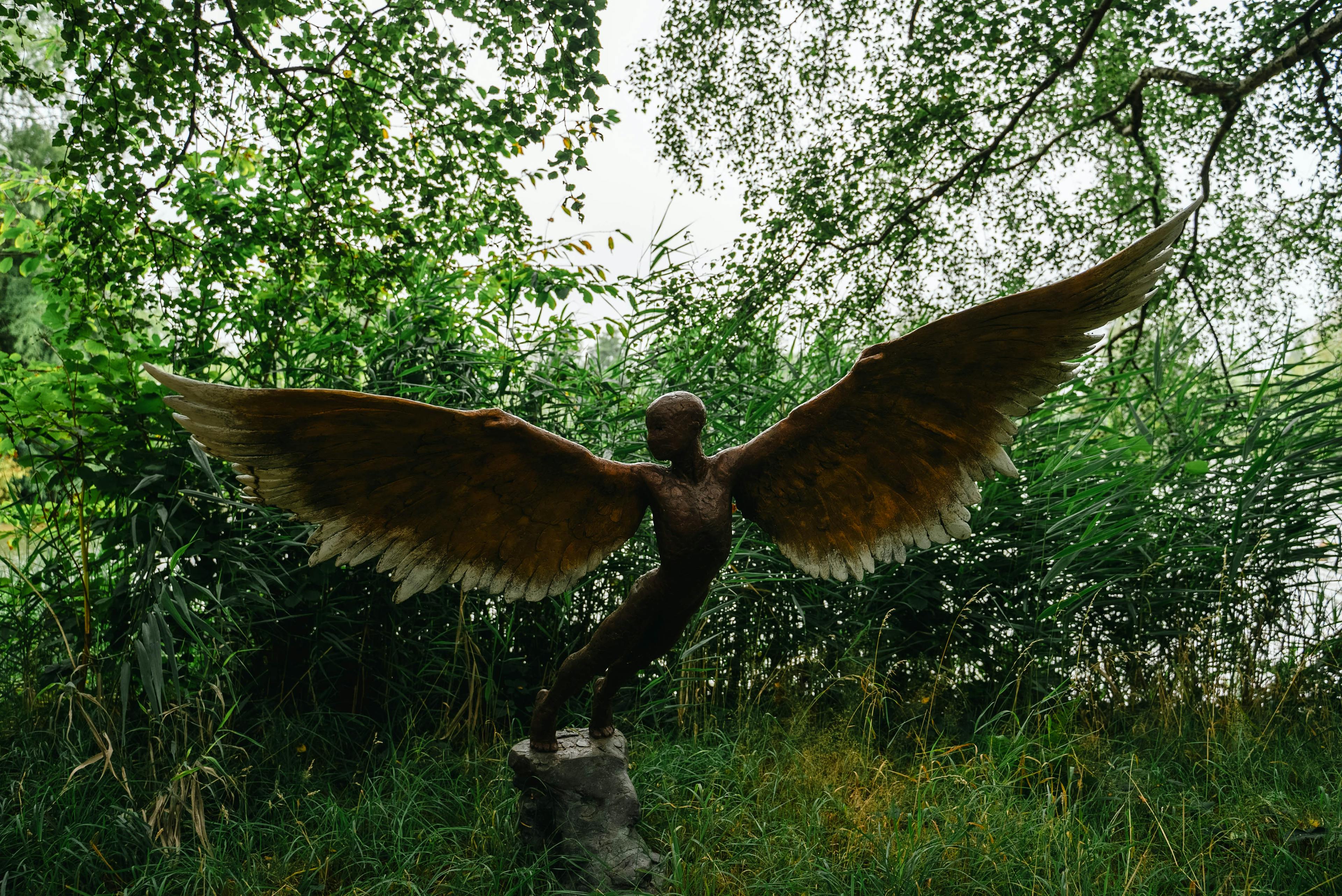 Sculpture by the Lakes - bronze sculpture of angel with huge wings