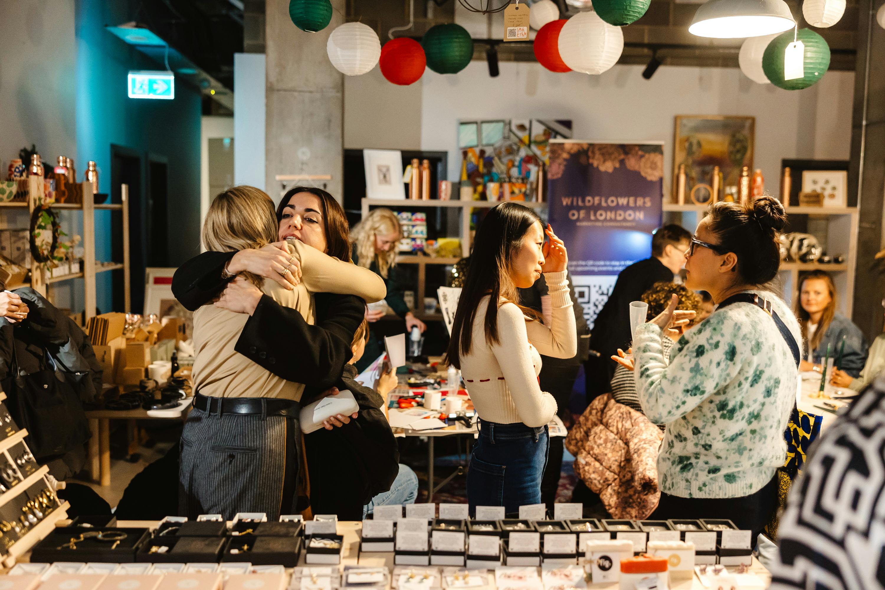 Lou wildflowers of London, attendees hugging