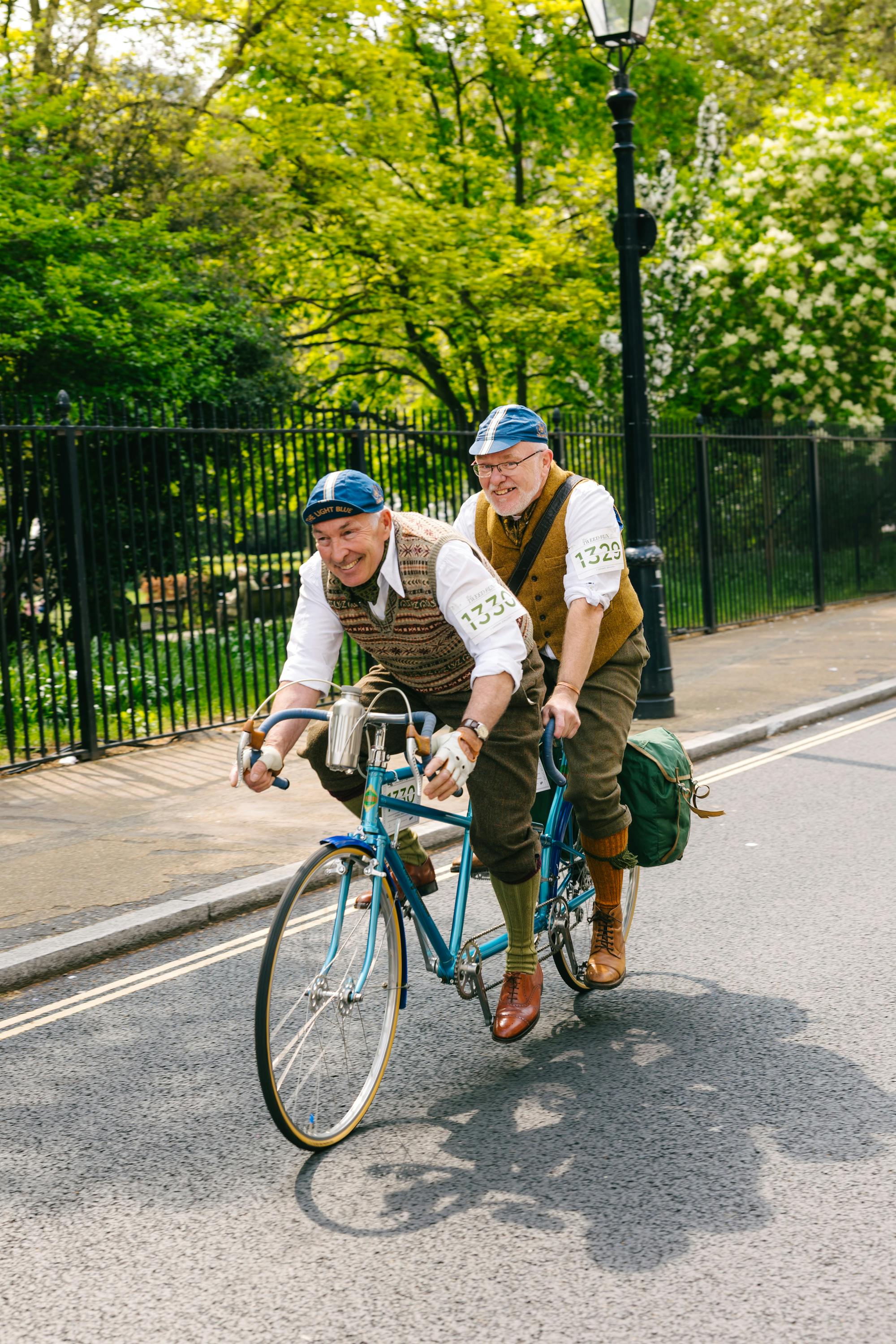 The Tweed Run two tweed-clad men on a tandem bike
