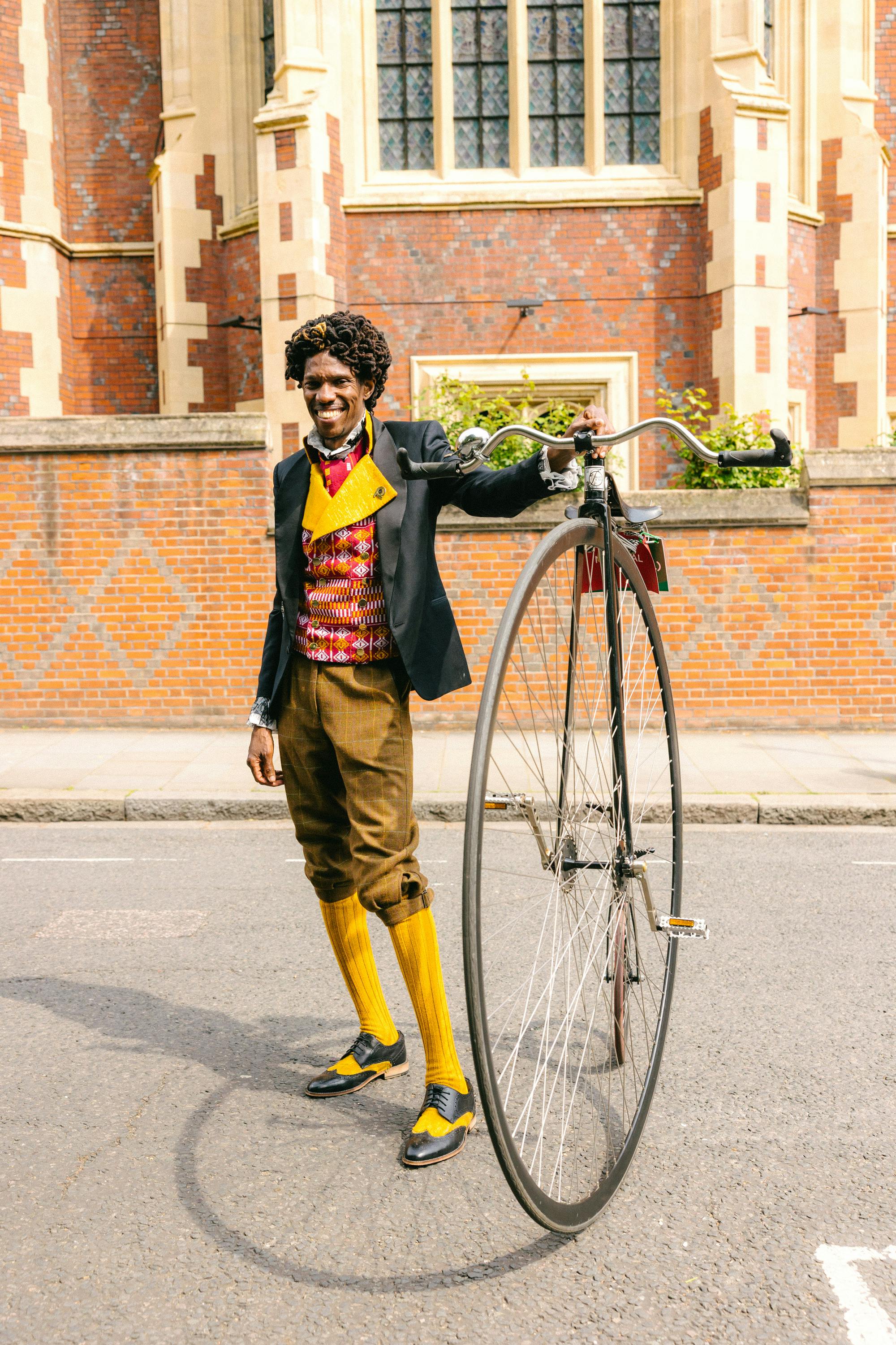 The Tweed Run man with penny-farthing bike