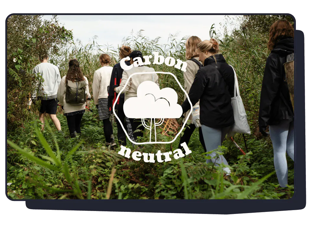 Carbon neutral badge over a team photo