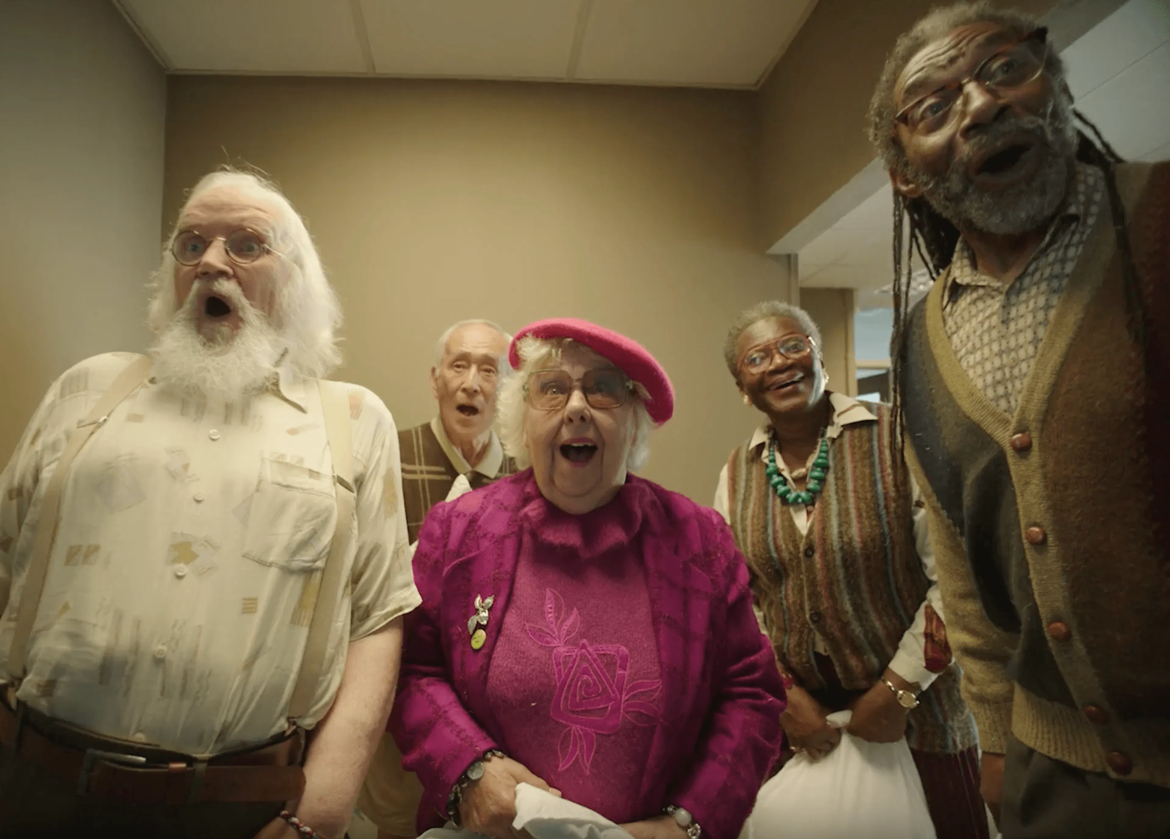 Elderly event goers excited at the door
