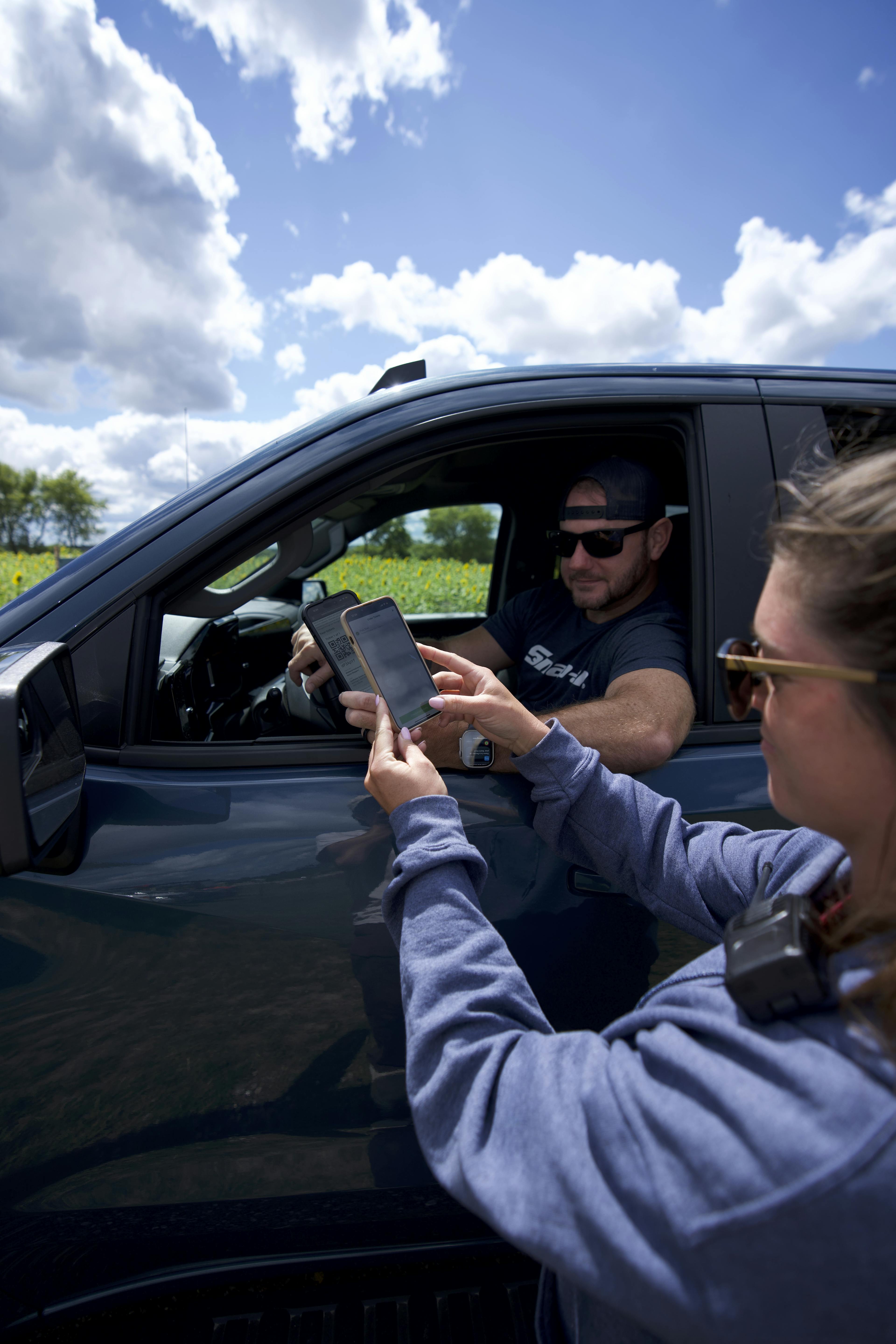 Scanning tickets at Thompson Farm