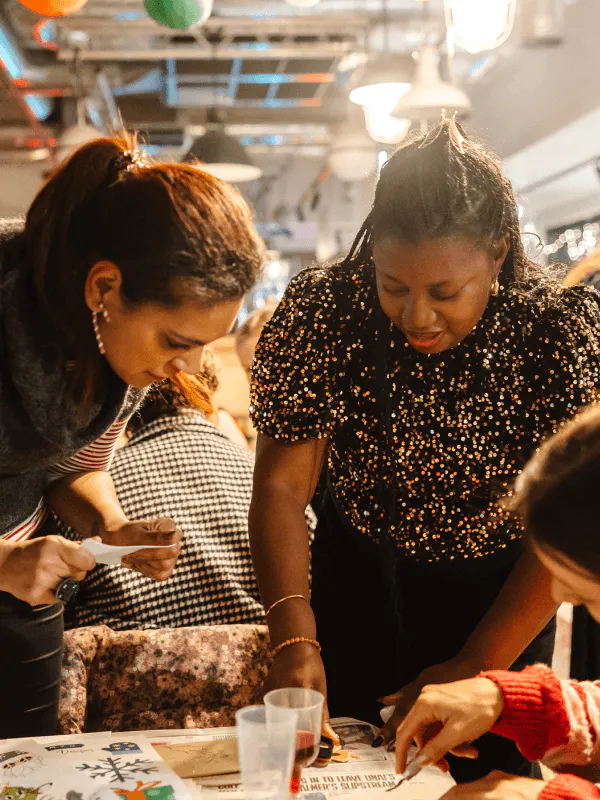 Two women at a workshop event