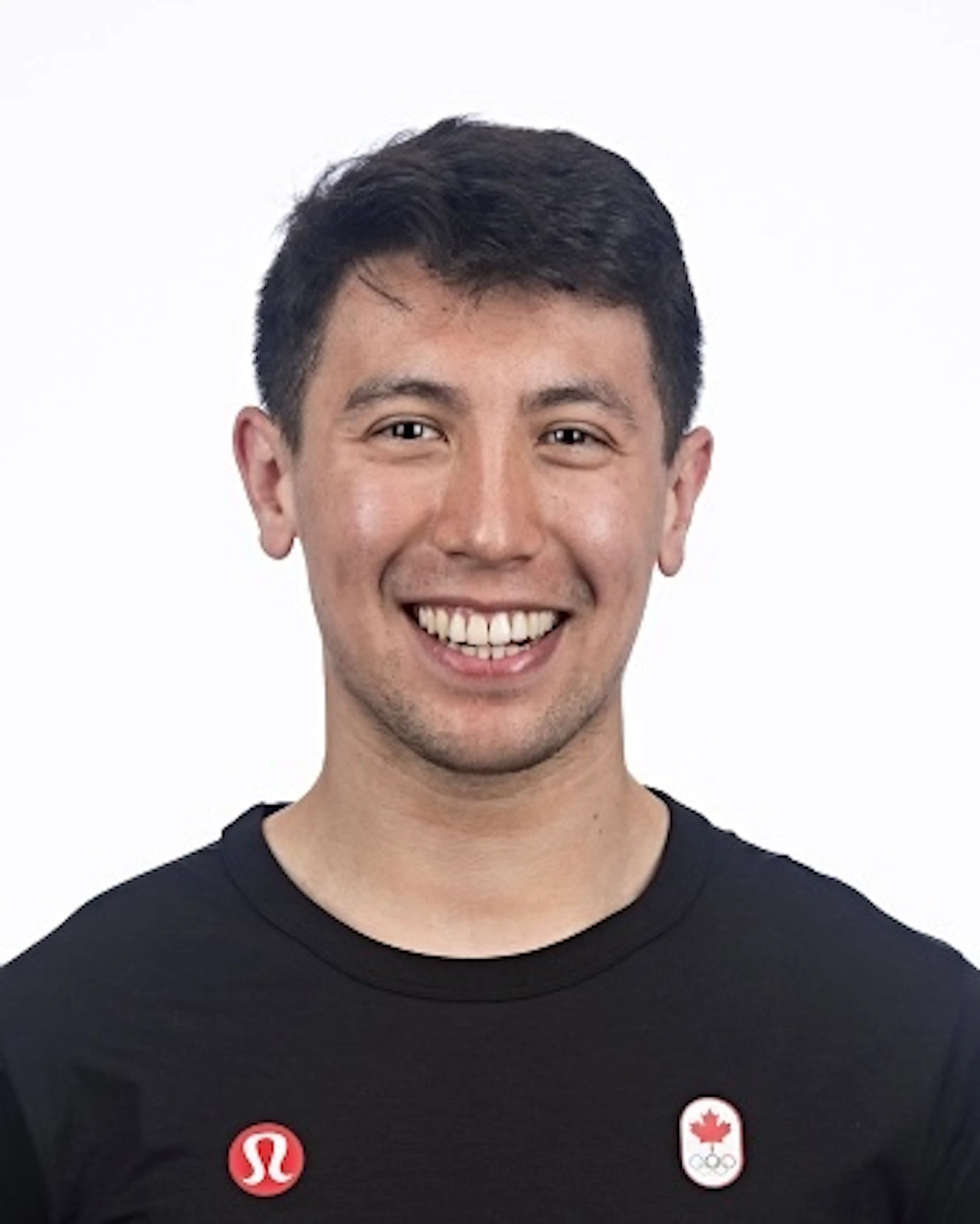 headshot of man wearing lululemon top